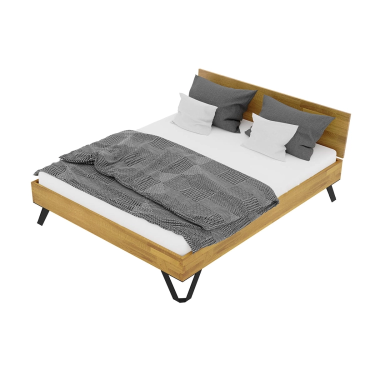 Dębowe łóżko TORO Classic 140x200 naturalny dąb zbliżenie na strukturę drewna olejowanego.