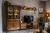 Aranżacja salonu z meblami dębowymi w stylu loft